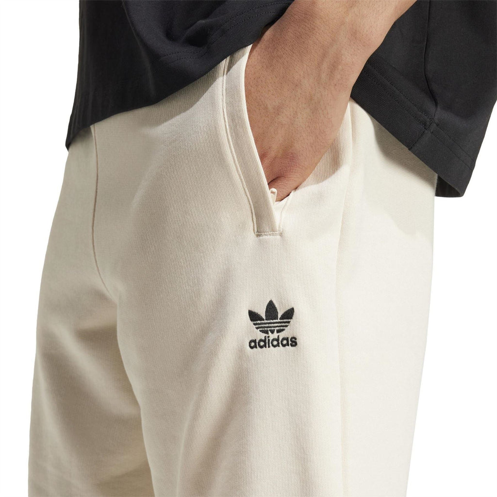 Wonder White adidas Originals shorts with front logo and angled side seam details