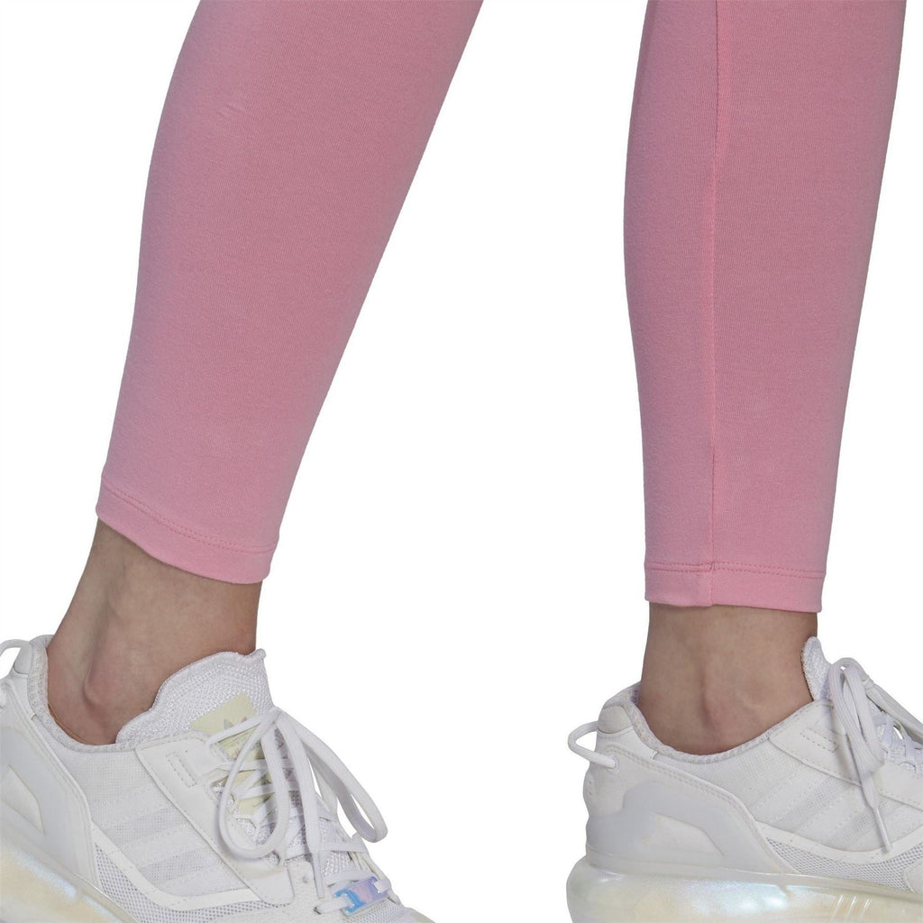 adidas Originals tight leggings for fitness and gymwear, close-up of black stretchy athletic leggings with the adidas logo