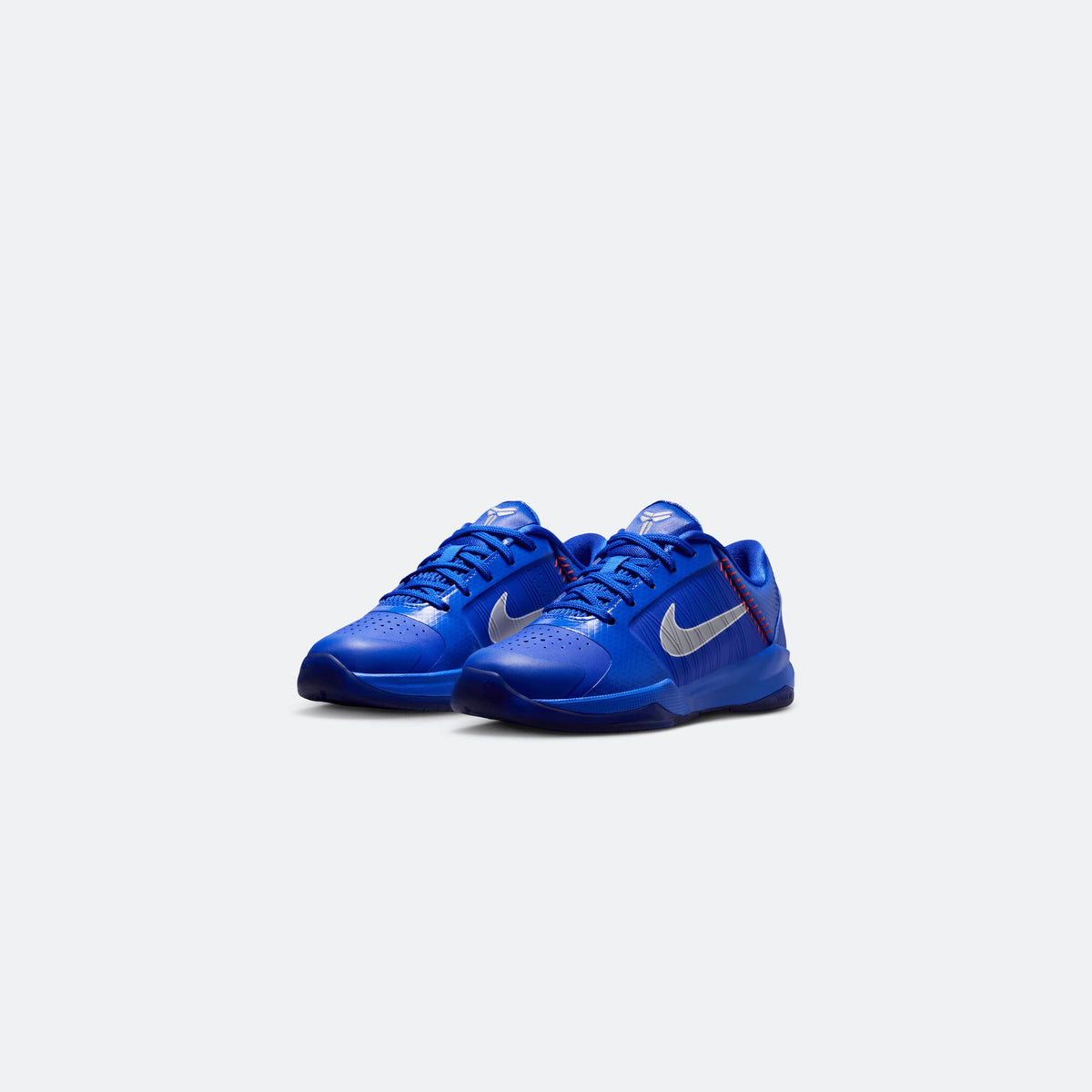 Pair of blue Nike Kobe V low-top kids basketball shoes with white Swoosh and laces