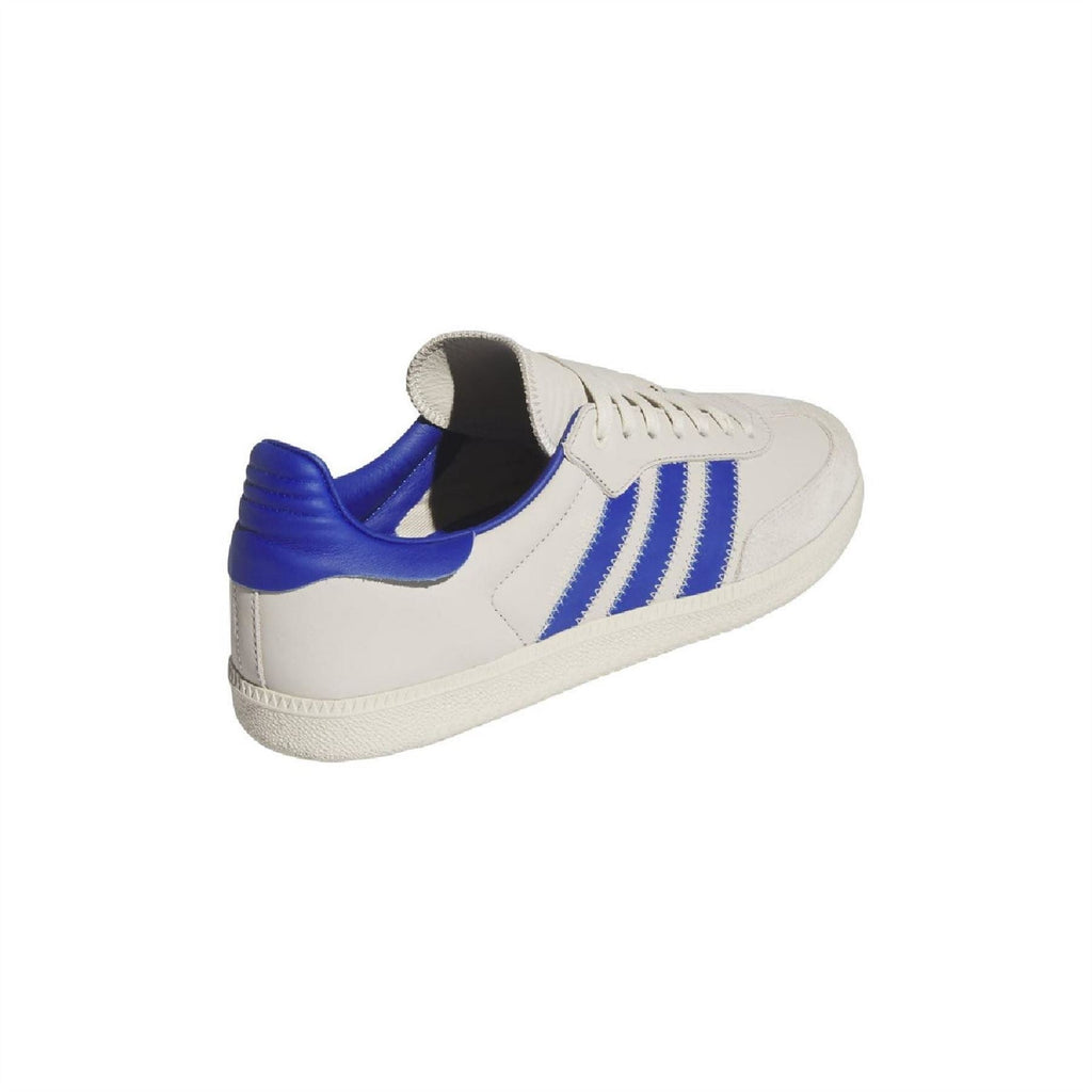 White and blue adidas Originals Samba trainers, rear side view with blue heel tab