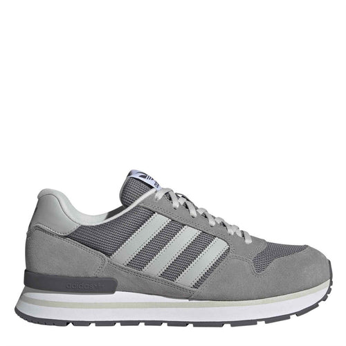 Grey suede-look lace-up sneaker with three white stripes and cushioned sole