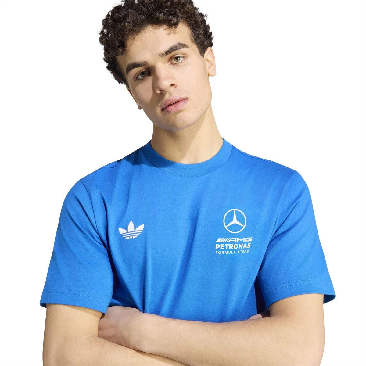 Blue crew-neck T-shirt close-up with Adidas trefoil and Mercedes Petronas chest marks