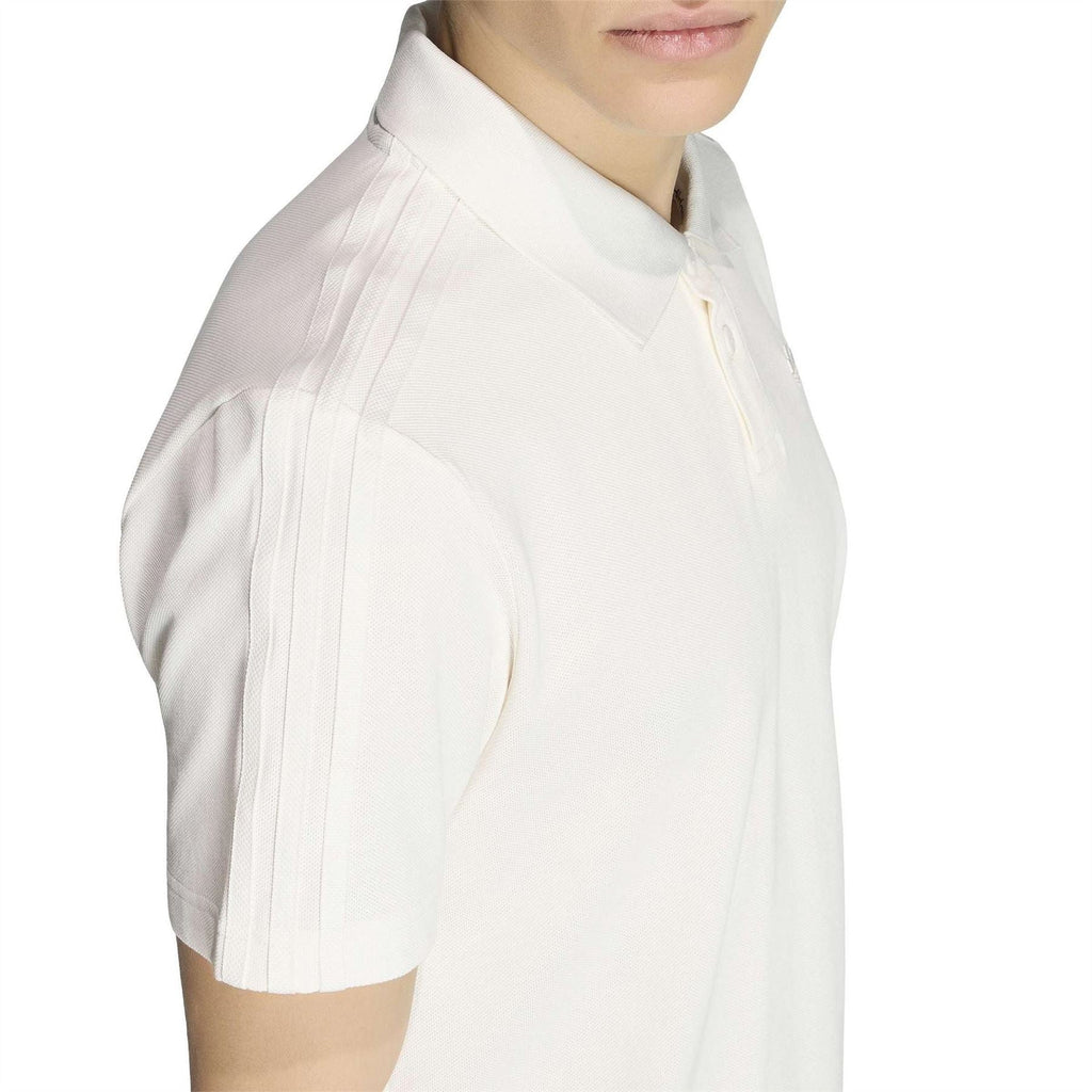 Cloud white polo shirt sleeve and shoulder seam close-up with collared neck