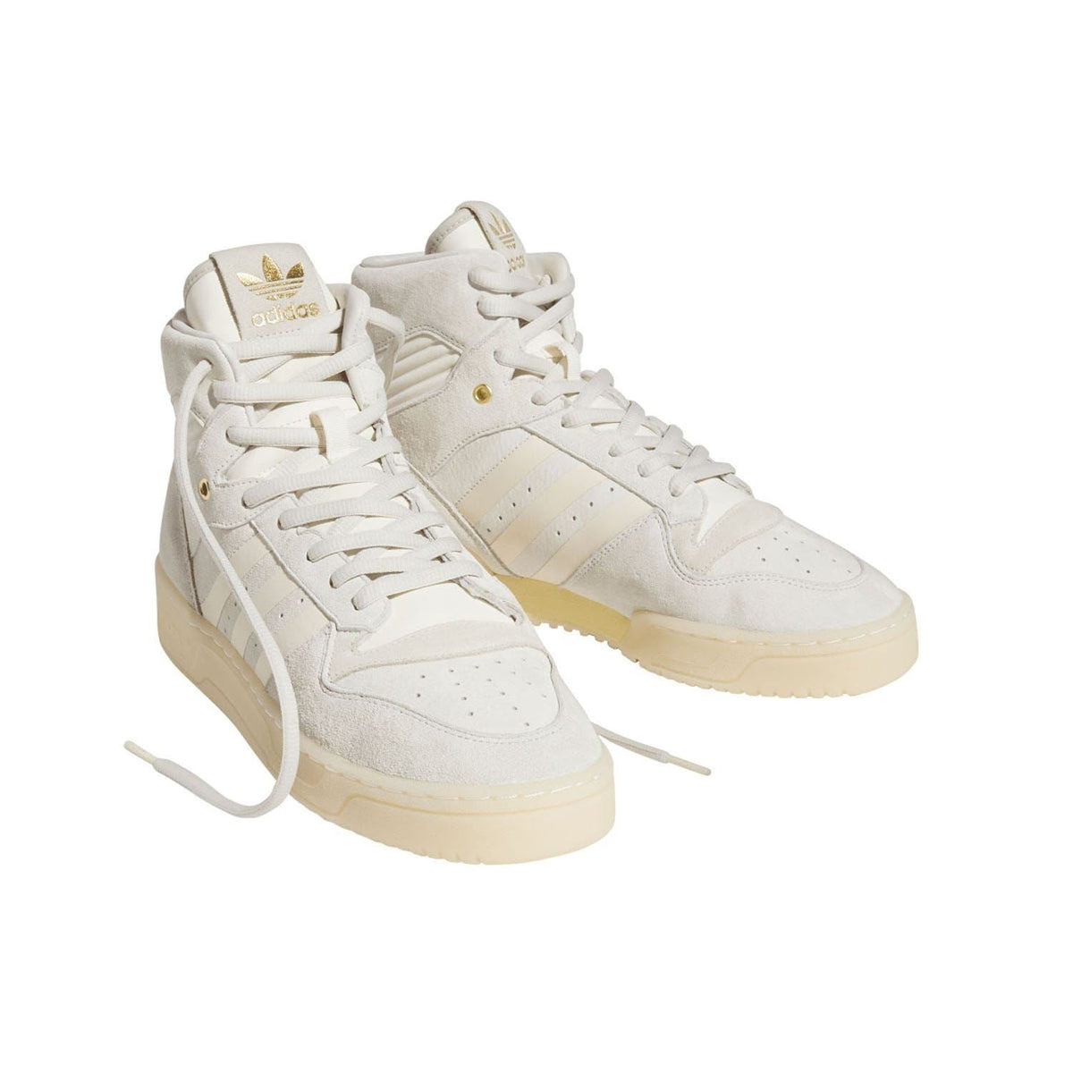 Pair of off-white high-top sneakers with lace-up closure and three stripe detailing