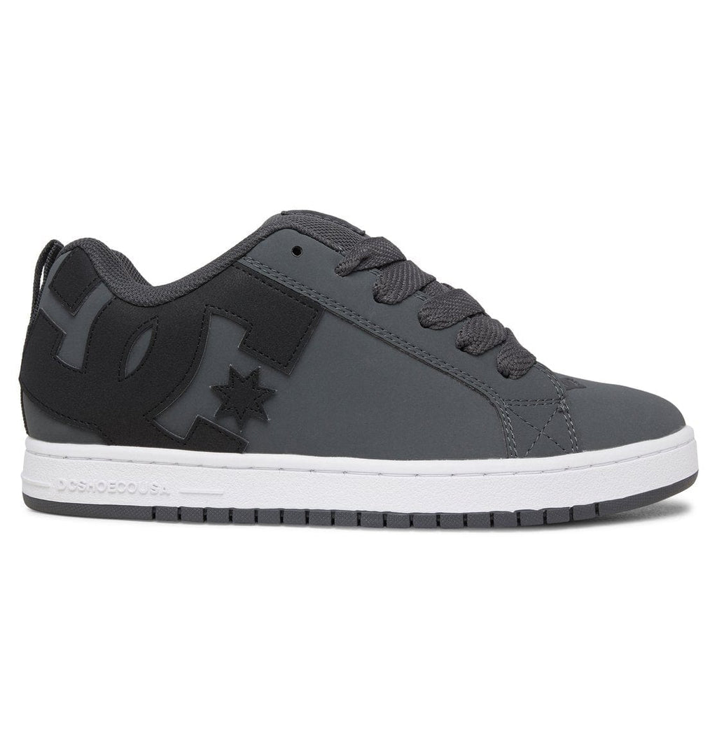 Grey and black low-top sneaker with star logo, DC logo, and white sole