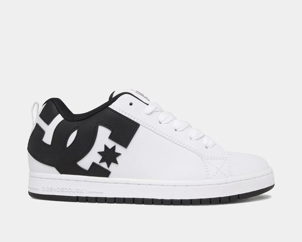 White skate sneaker with black overlays, star logo, and lace-up design