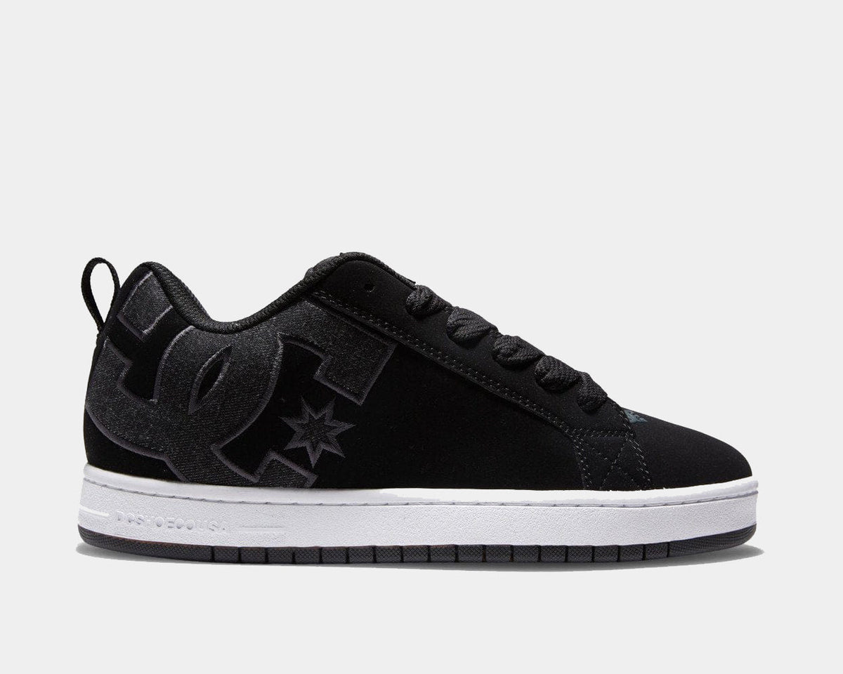 Court Graffik low-top sneaker in black with large DC logo, star accent, and lace-up front