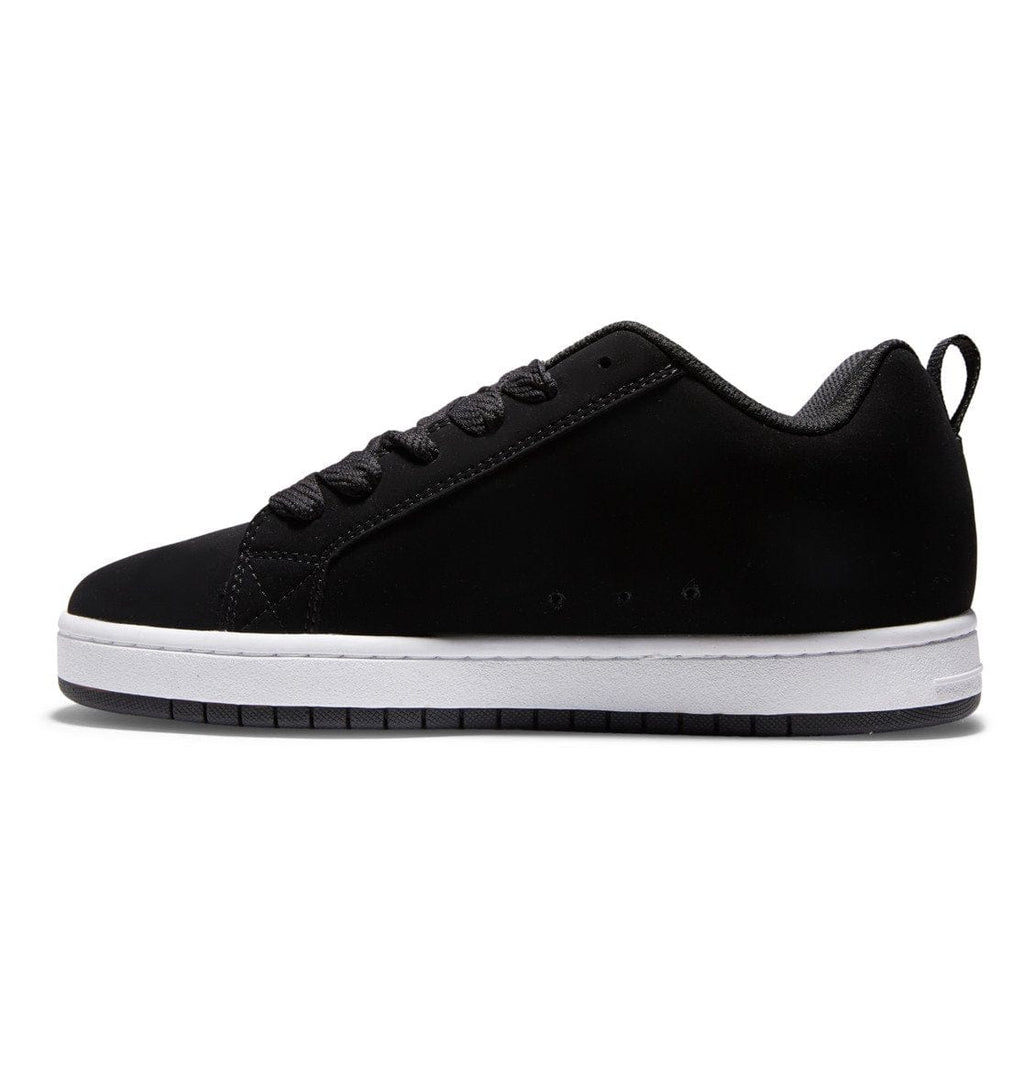 Black low-top skate sneaker with lace-up closure and white rubber sole
