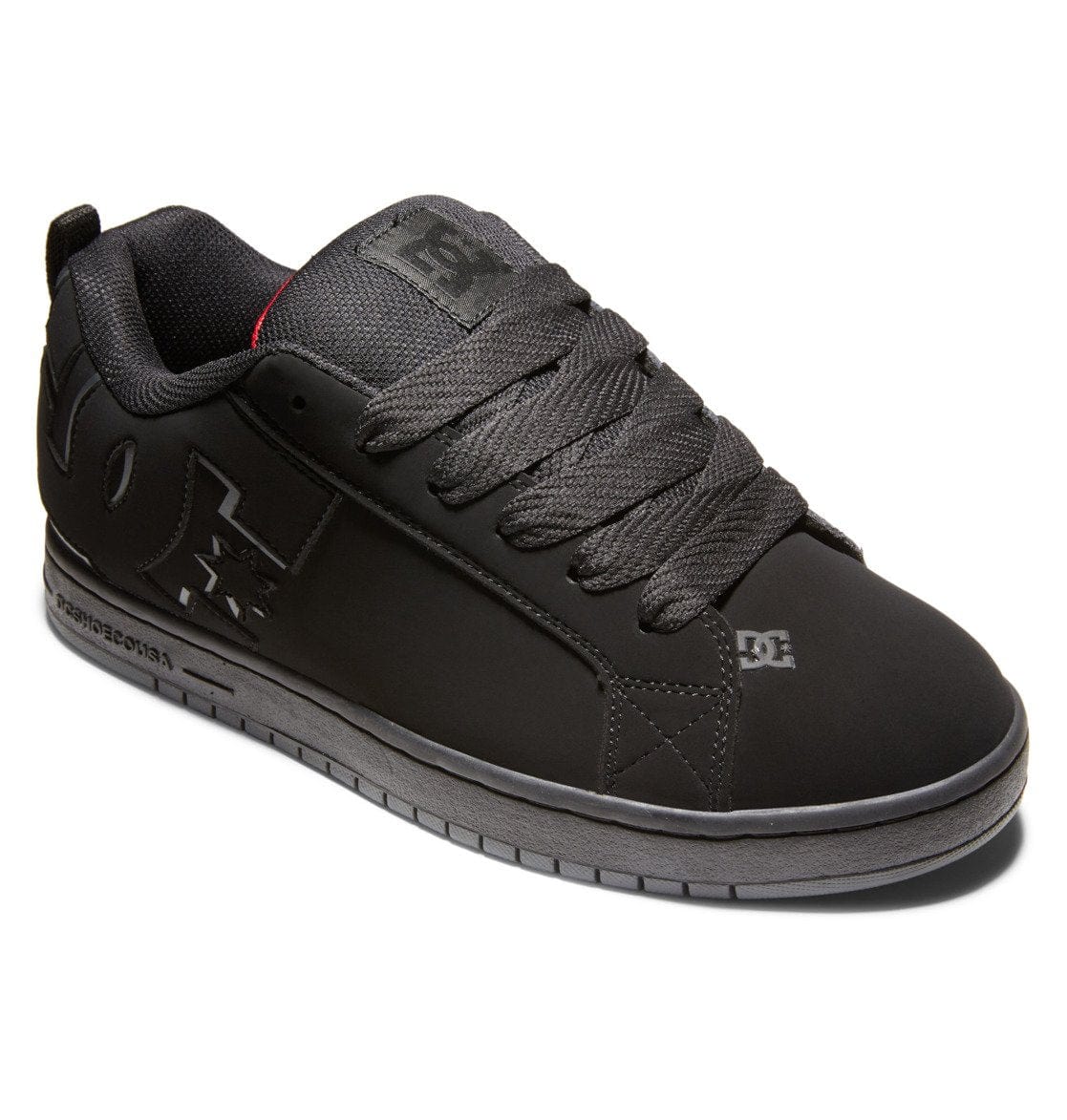 Black skate shoe with textured gray overlays, lace-up front, and stitched seams