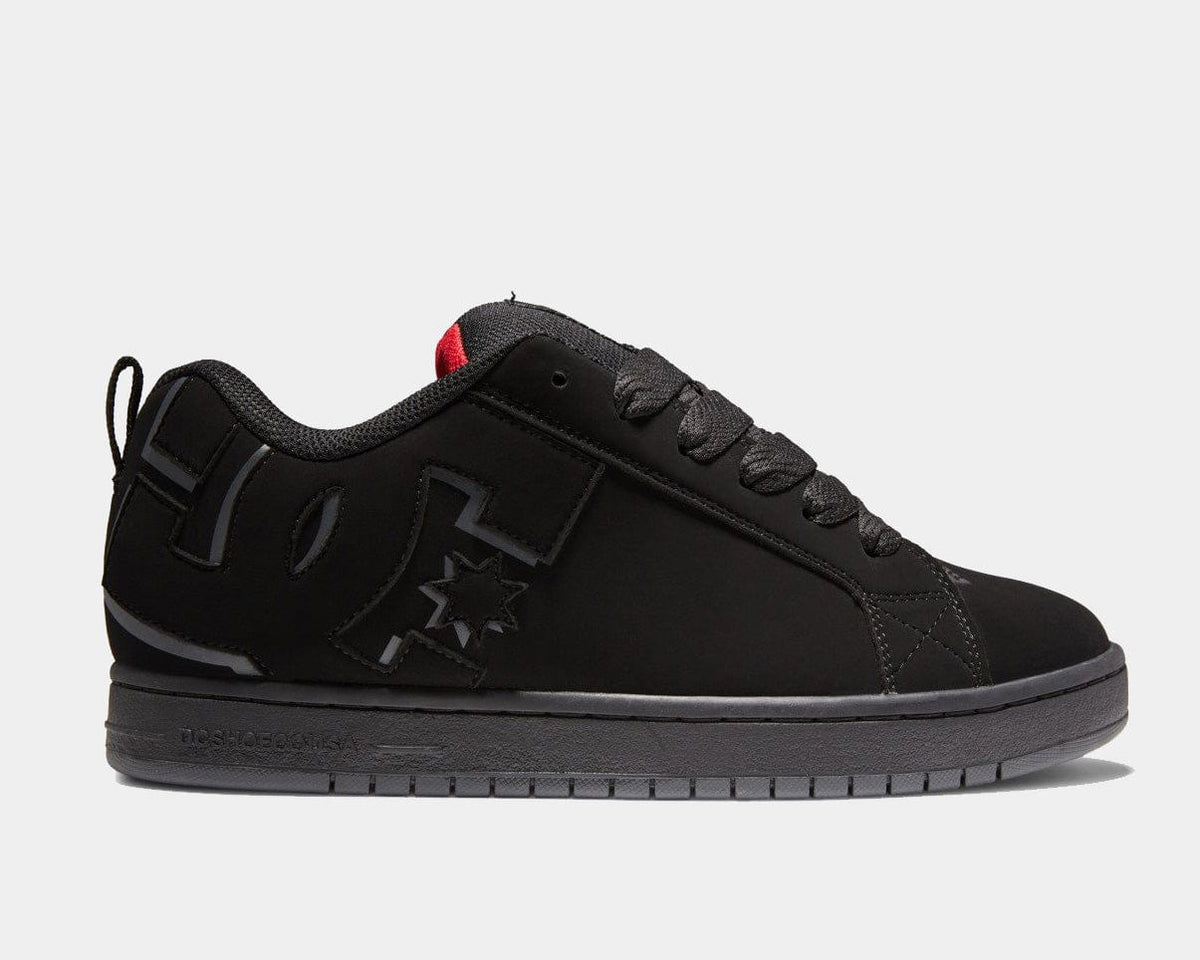 Black skate shoe with gray panel graphics, star emblem, and black laces