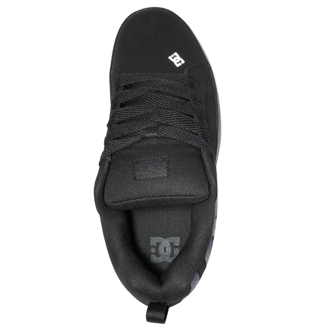 Court Graffik sneakers side profile in black with DC logo on heel and lace-up closure