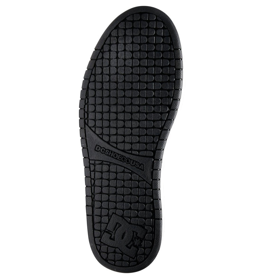 Black rubber outsole with textured tread pattern and DC logo