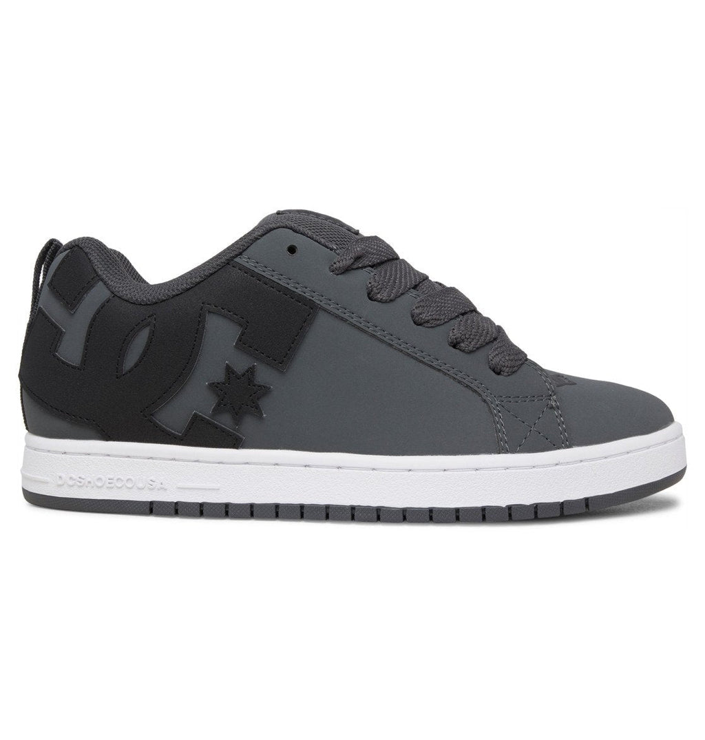 Black and gray low-top sneakers with star emblem, lace-up front, and white sole