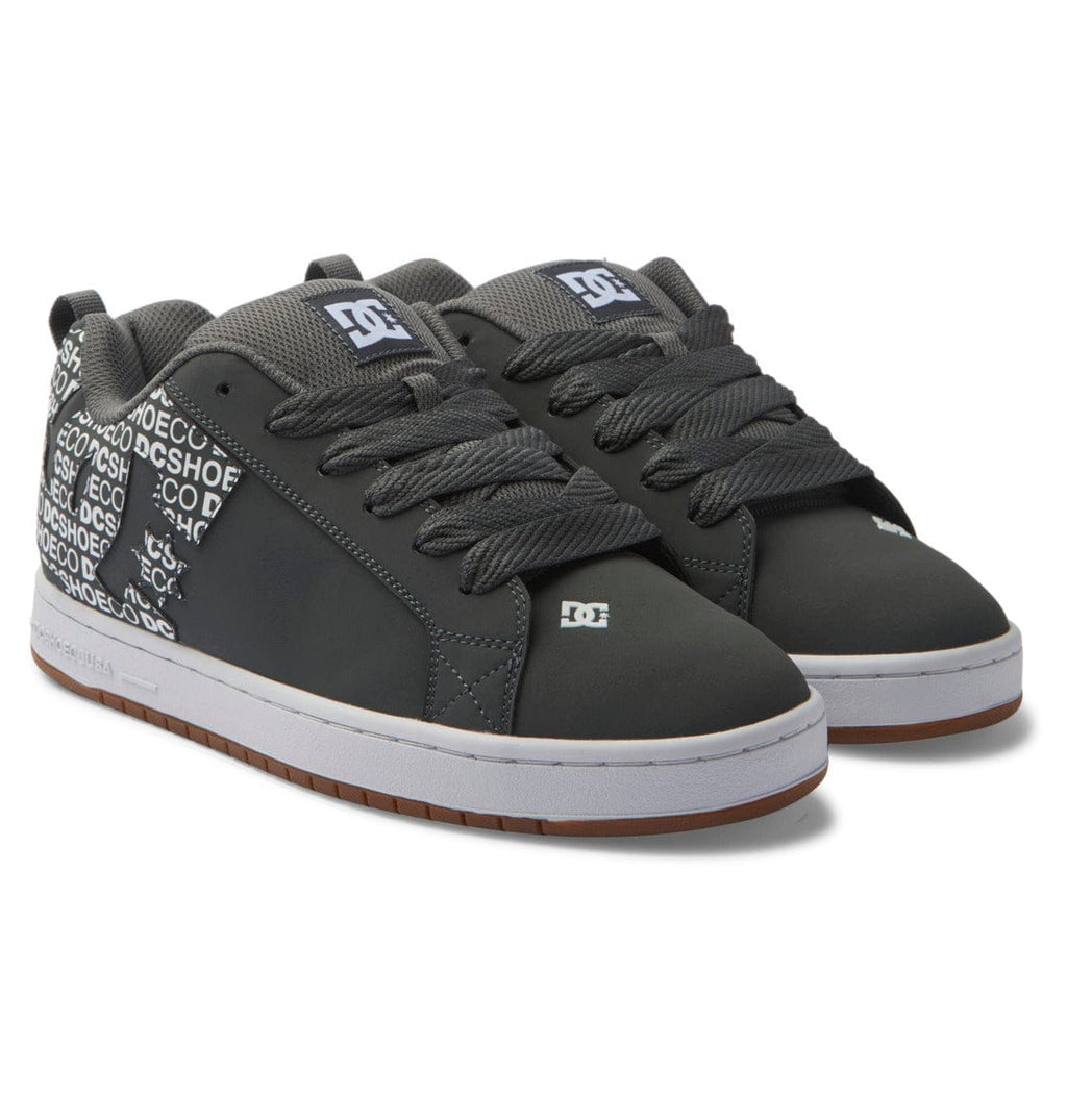 Charcoal low-top sneakers with patterned tongue, lace-up front and DC logo accents