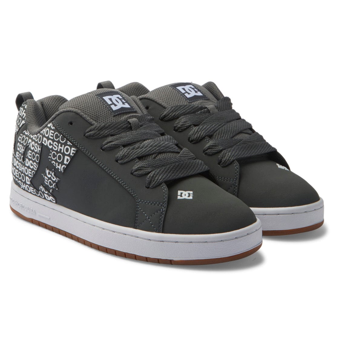 Charcoal low-top sneakers with patterned tongue, lace-up front and DC logo accents