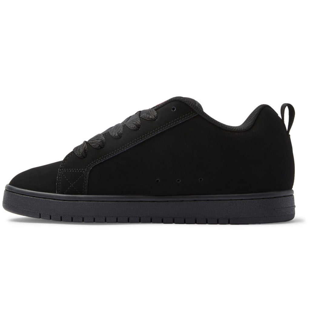 Black low-top sneakers with textured lace panel, subtle stitching, and flat rubber sole
