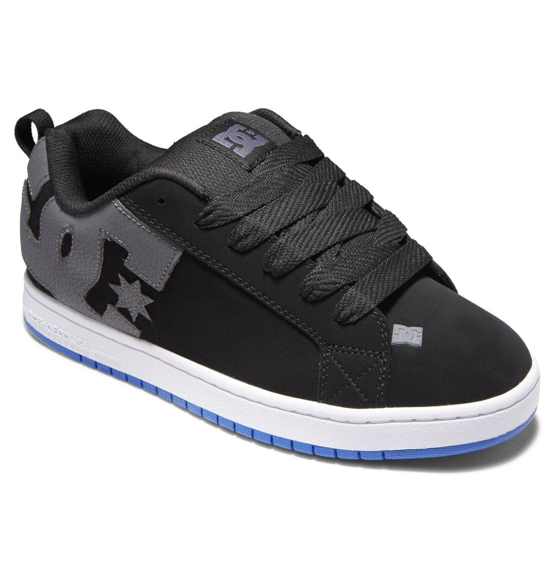 Black skate shoe with gray panels, star emblem, and white sole with blue edge trim