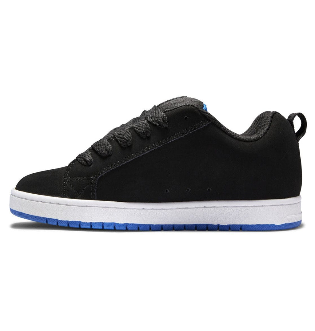 Black skate shoe with smooth upper, lace-up front, and white sole with blue trim