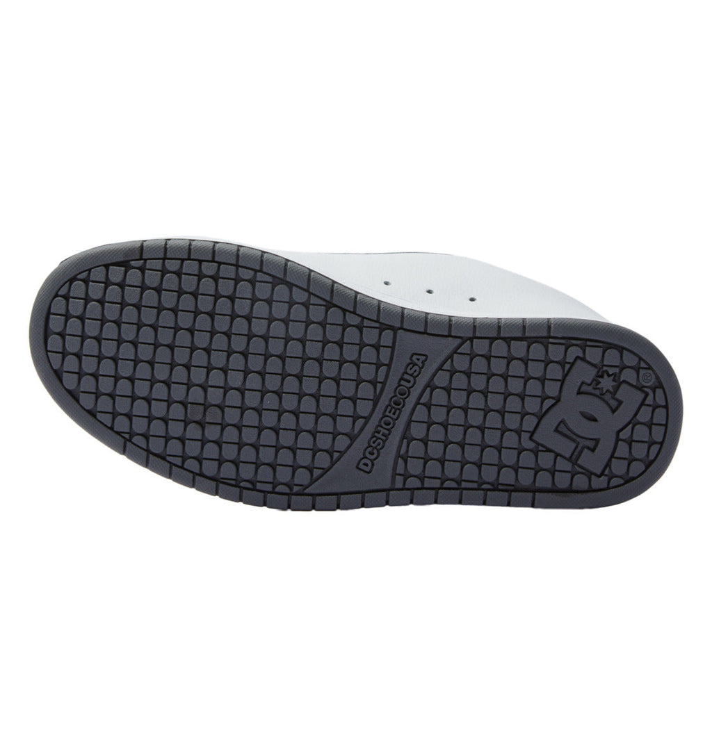 Black rubber outsole with grid tread and DC logo stamp