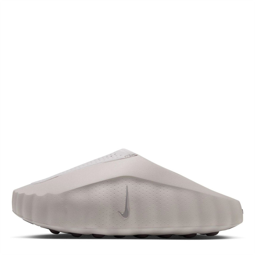 Light gray Nike slide sandals with perforations and cushioned footbed