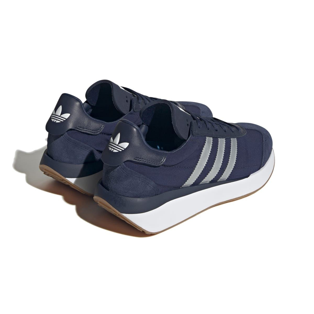 adidas Originals Courty XLG trainers, navy heel view with white triple stripe accents