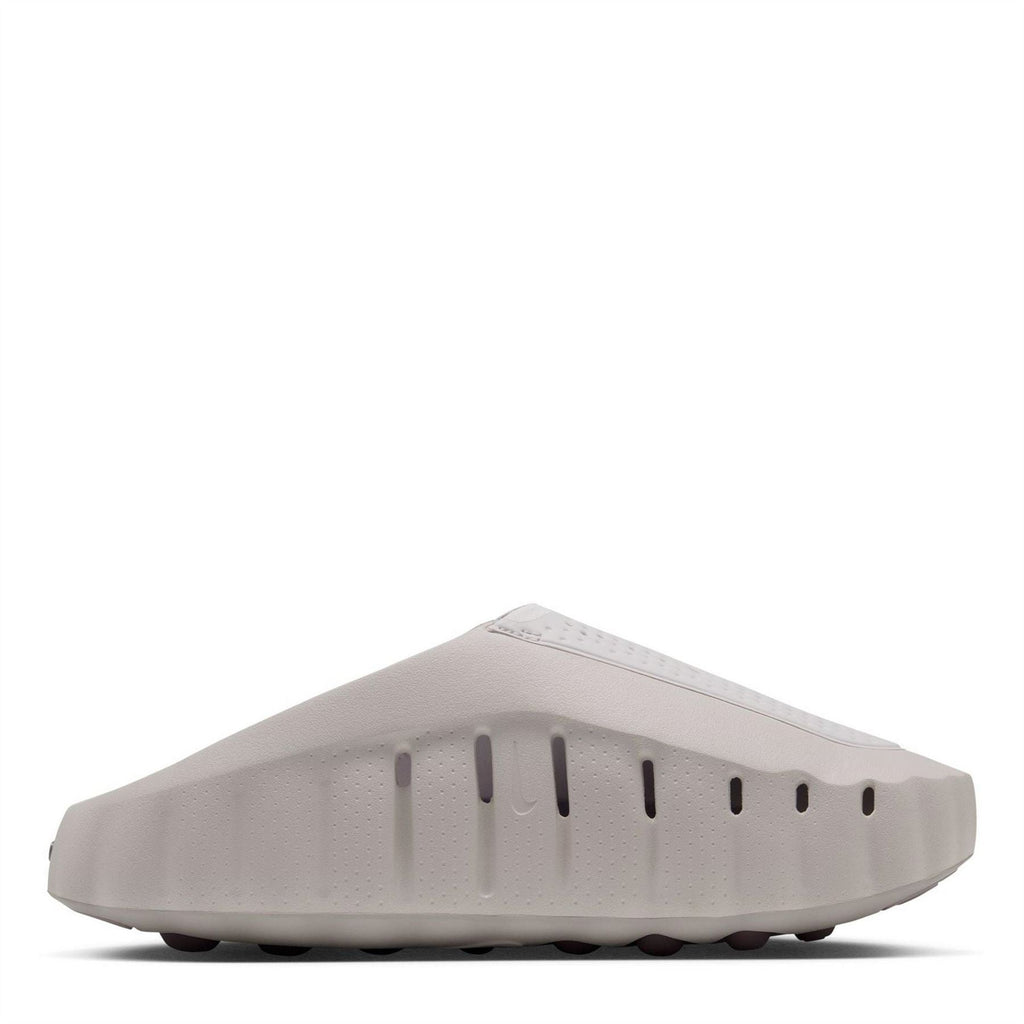 Light gray rubber outsole with raised traction ridges and nubs