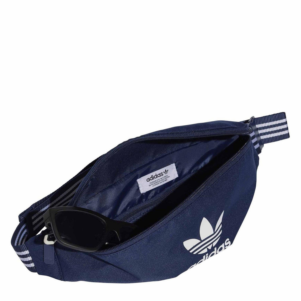 Dark indigo waist bag with open zip pocket and adidas logo patch