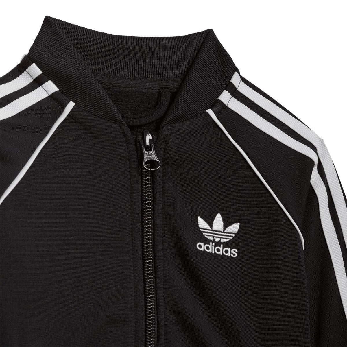 Infant black tracksuit jacket with zip, adidas logo, and white triple stripe detail