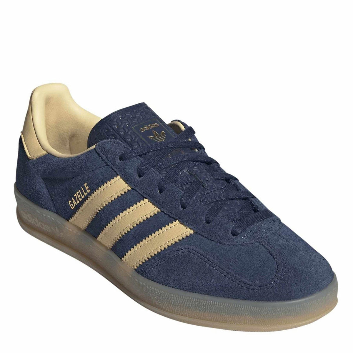 Navy adidas Gazelle sneakers with cream stripes, detailed toe panel, and gold collar lining