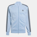 adidas Originals Adicolor Classic SST track jacket in navy with white stripes, front zipper, and ribbed cuffs and collar.