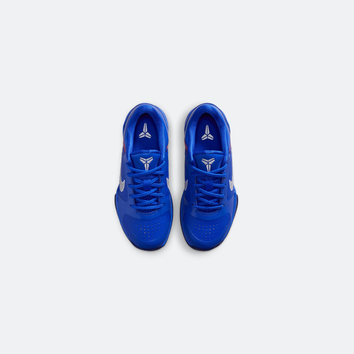Blue Nike Kobe V low-top kids basketball shoes, top view with lace eyelets
