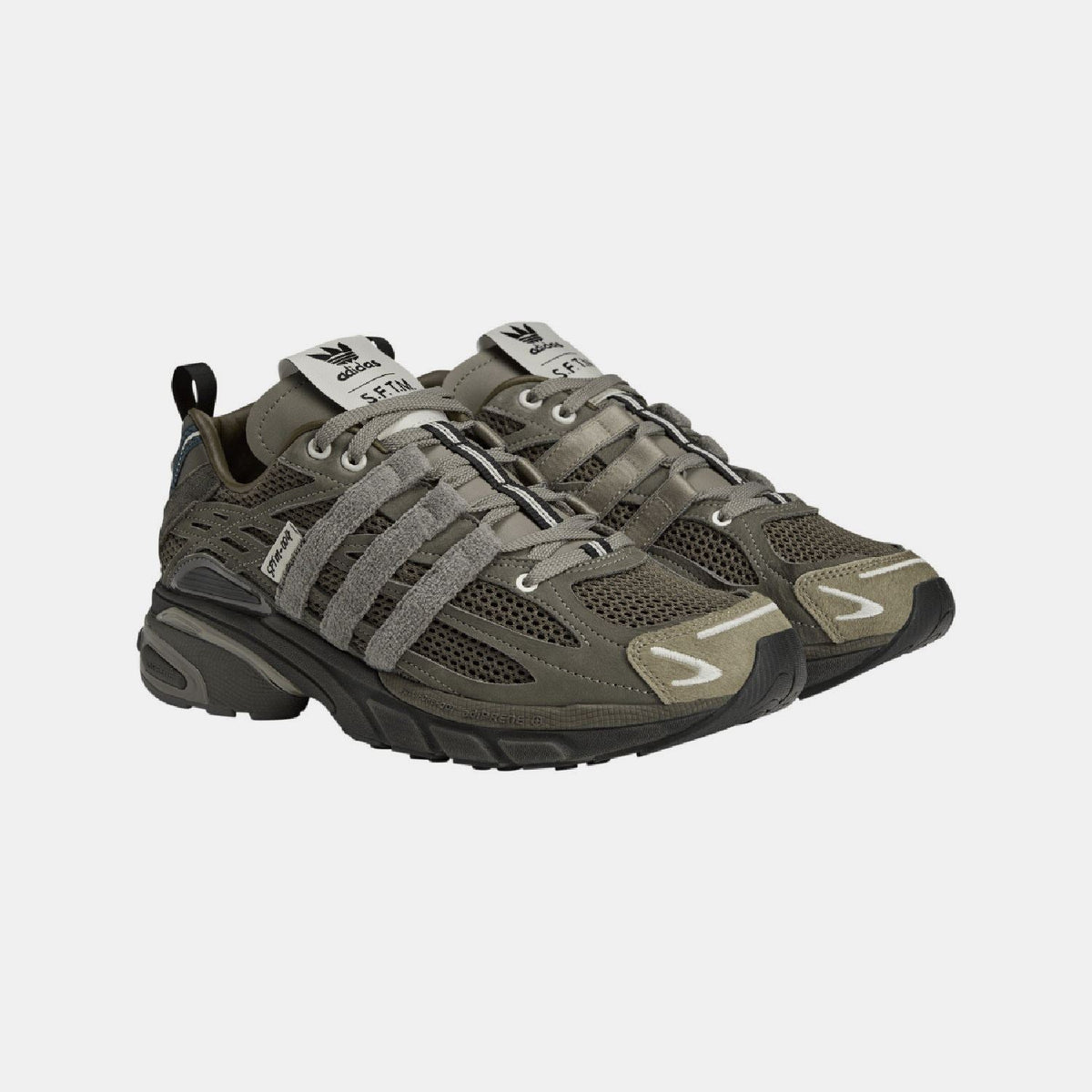 Cushion STFM trainers 3/4 view, olive-brown mesh upper, gray laces, thick tread sole