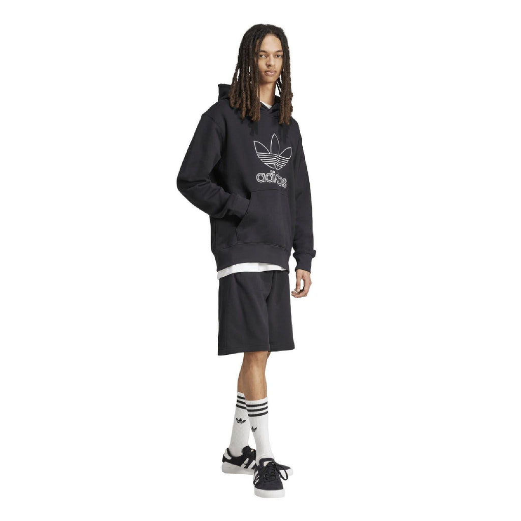 Black adidas trefoil outline hoodie worn with black shorts and striped socks
