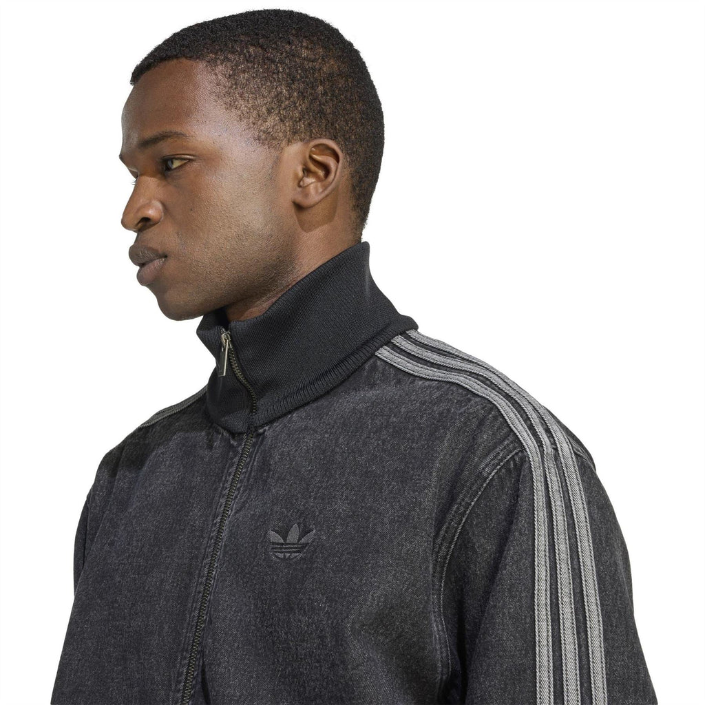 Mens black denim jacket close-up with adidas logo, high collar, and zip placket