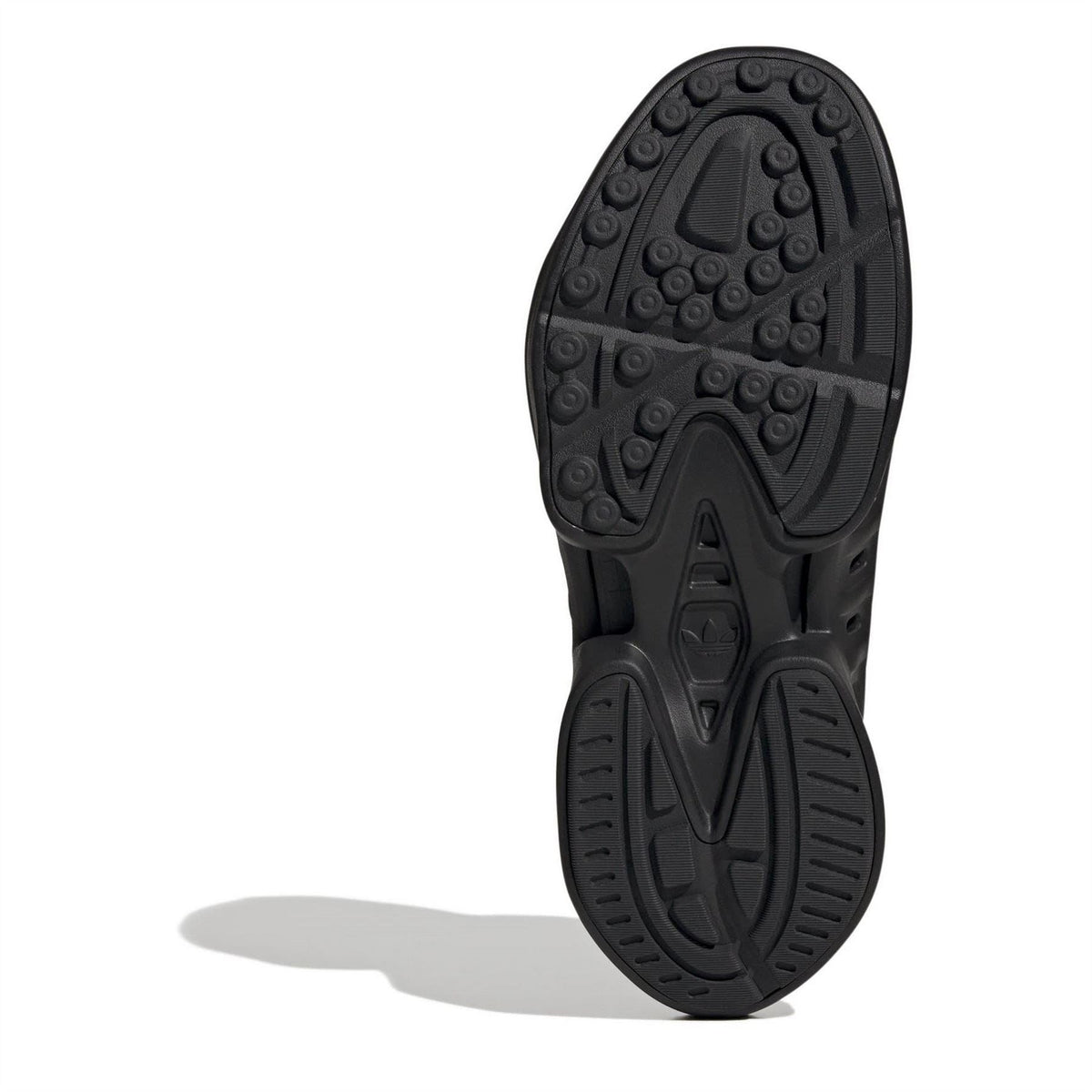 adidas Adifom low-top sneakers outsole in black, textured traction tread