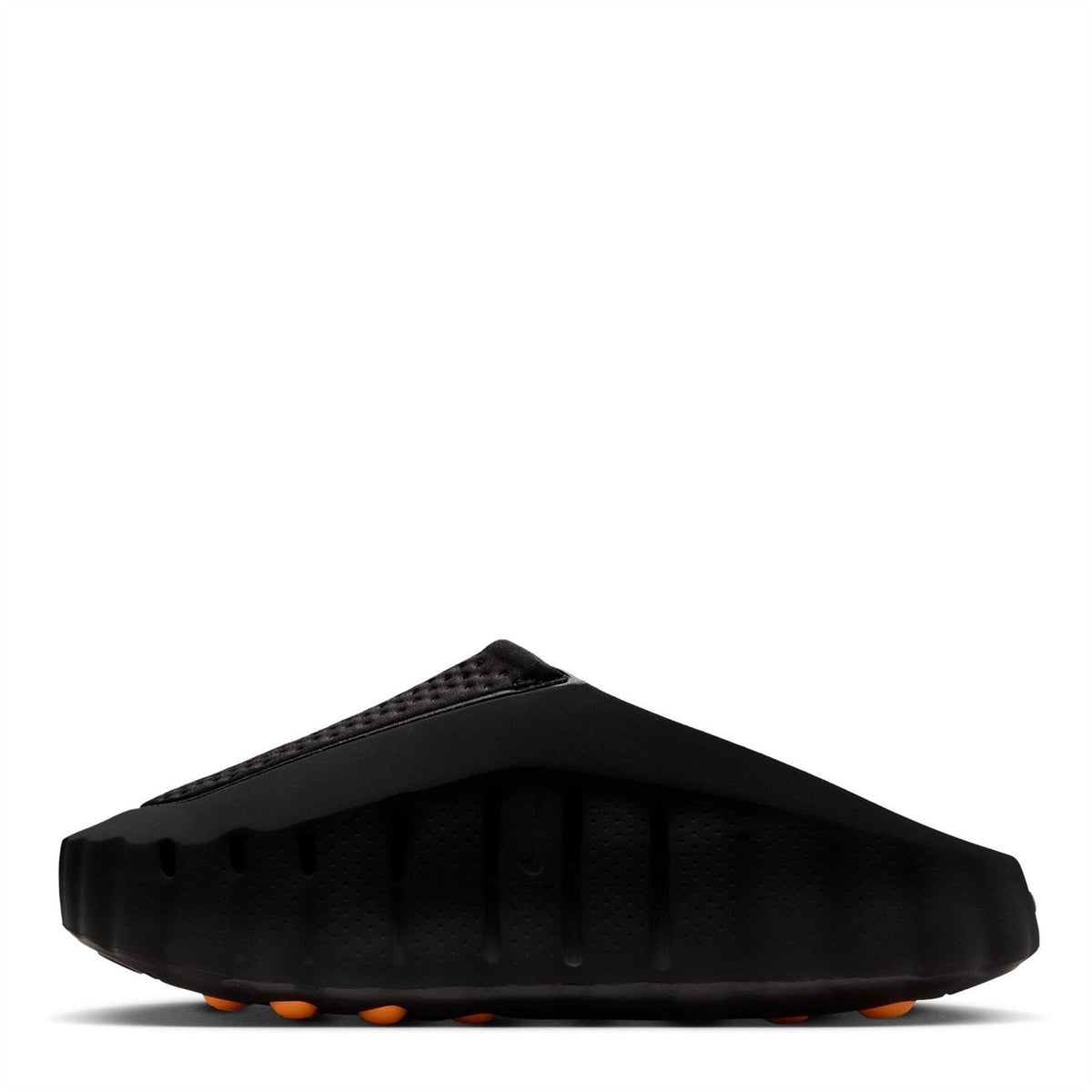 Black Nike slide sandals, side profile with orange traction pods on outsole