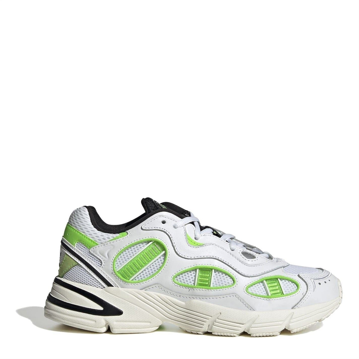 Low-top chunky-sole sneakers in white with neon green accents and a black heel tab