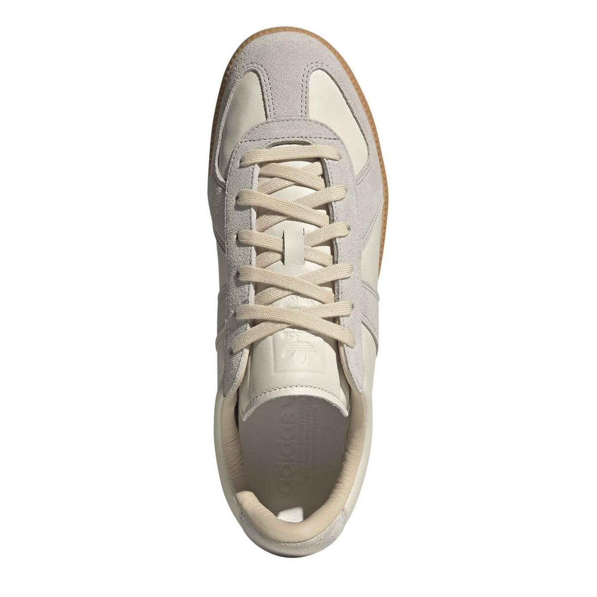 Cream and gray lace-up sneaker with visible tongue and padded interior