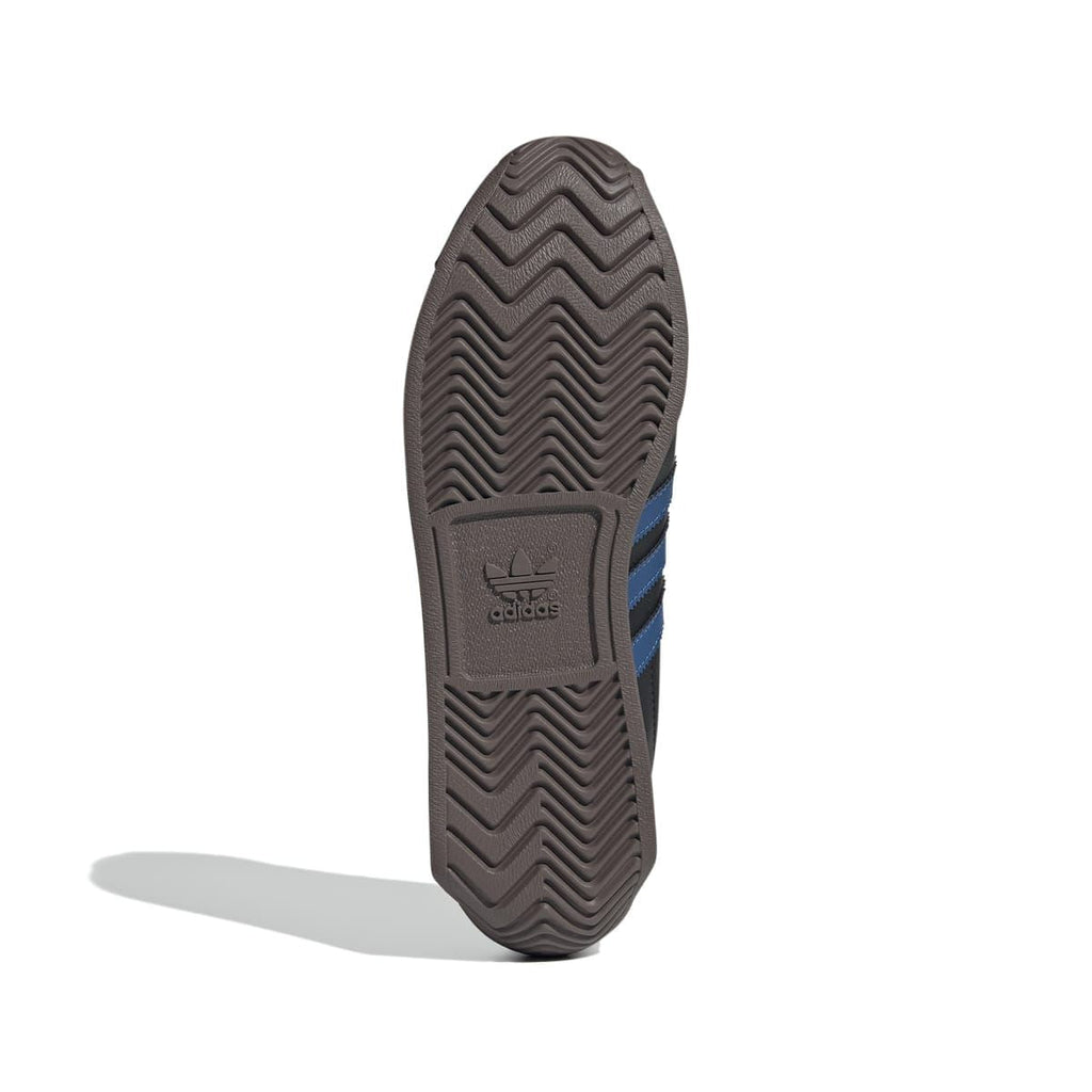 Trainer outsole with zigzag tread and adidas logo, dark brown rubber bottom