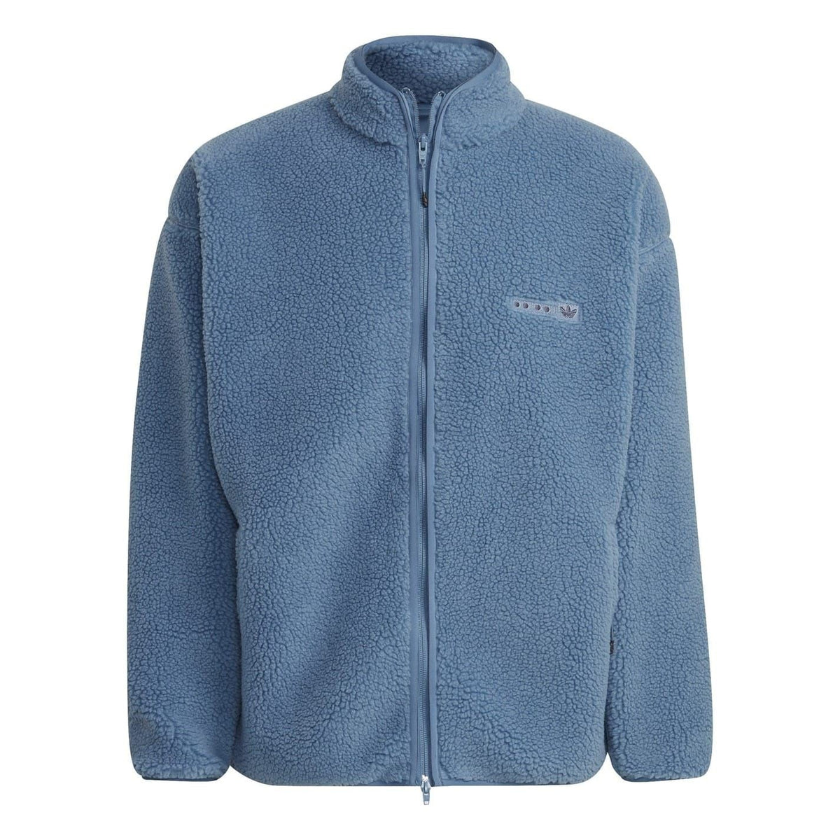adidas Originals Sherpa Jacket sweatshirt with plush lining, cozy fit, and classic design, shown on a model.