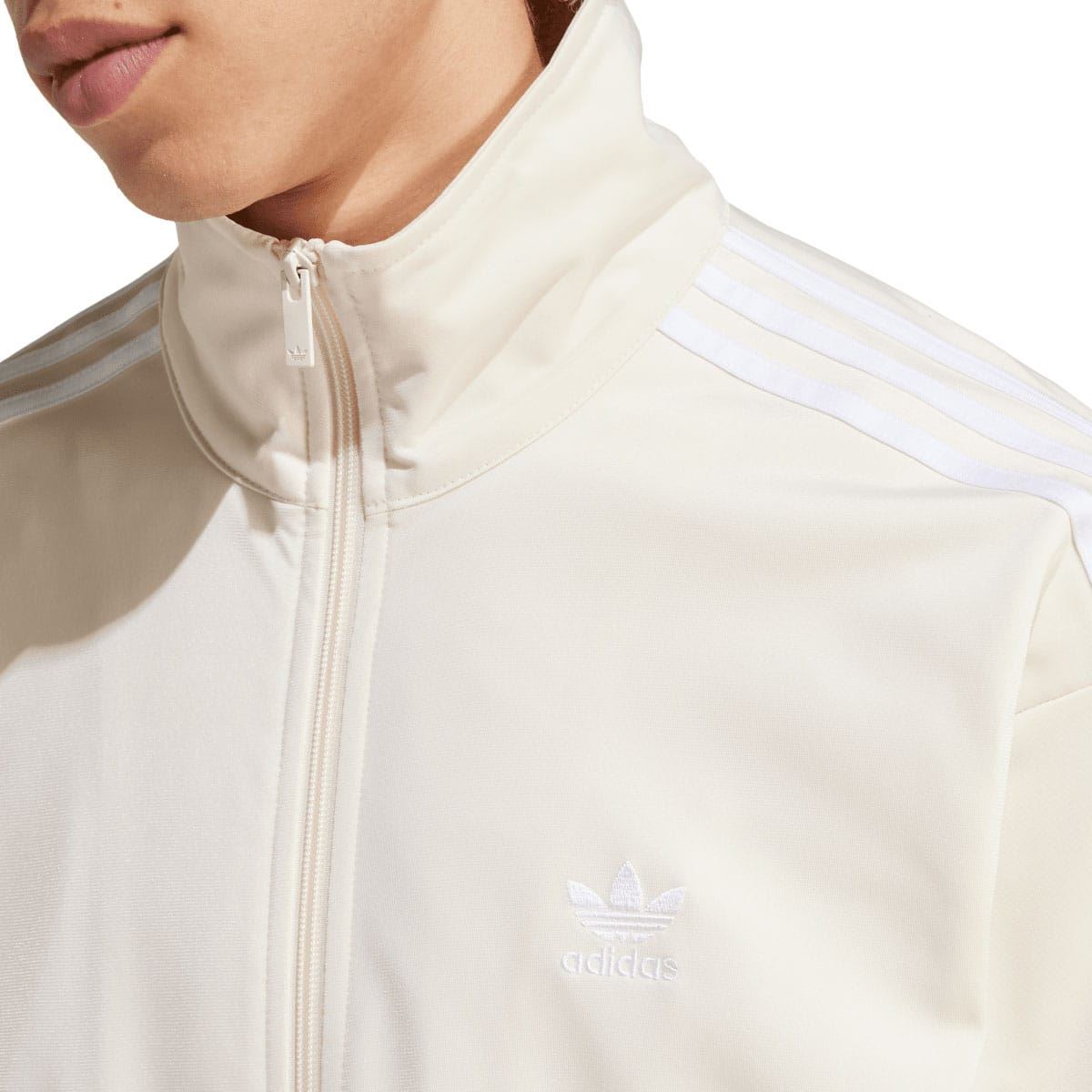 adidas Originals white track top close-up: stand collar zip and trefoil logo
