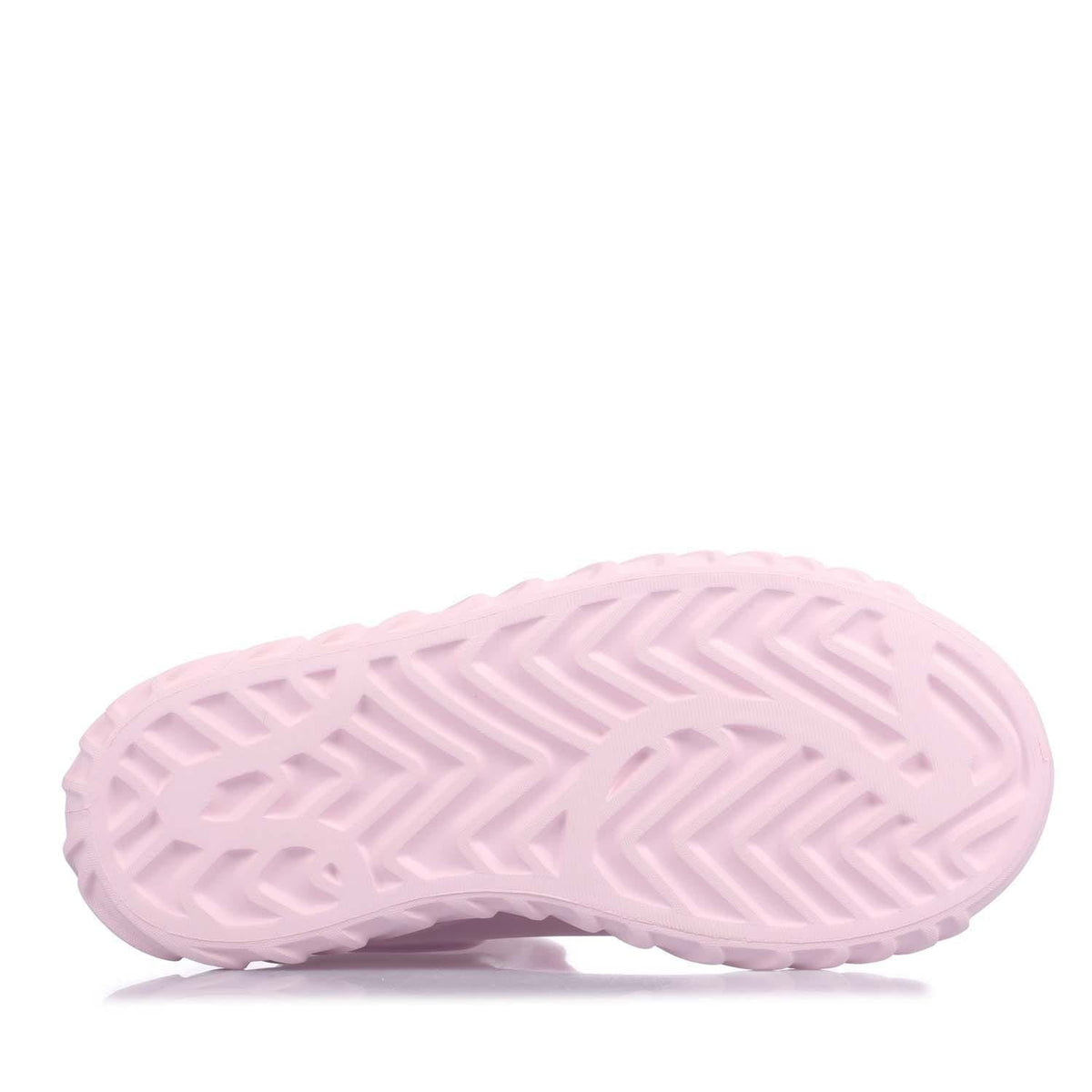 Pink outsole view of mid-top boots with chevron tread pattern