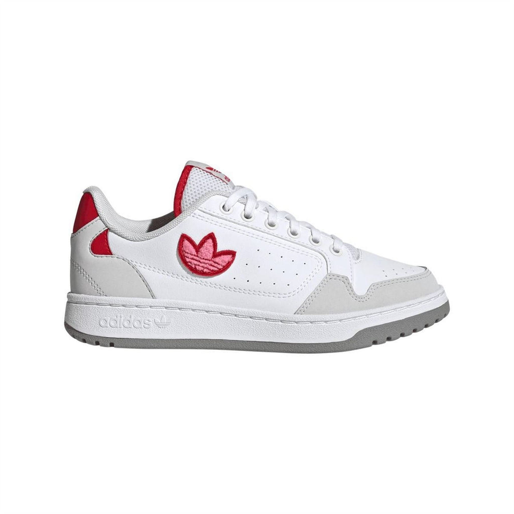 White low-top trainers with red butterfly logo, lace-up front, and textured rubber sole