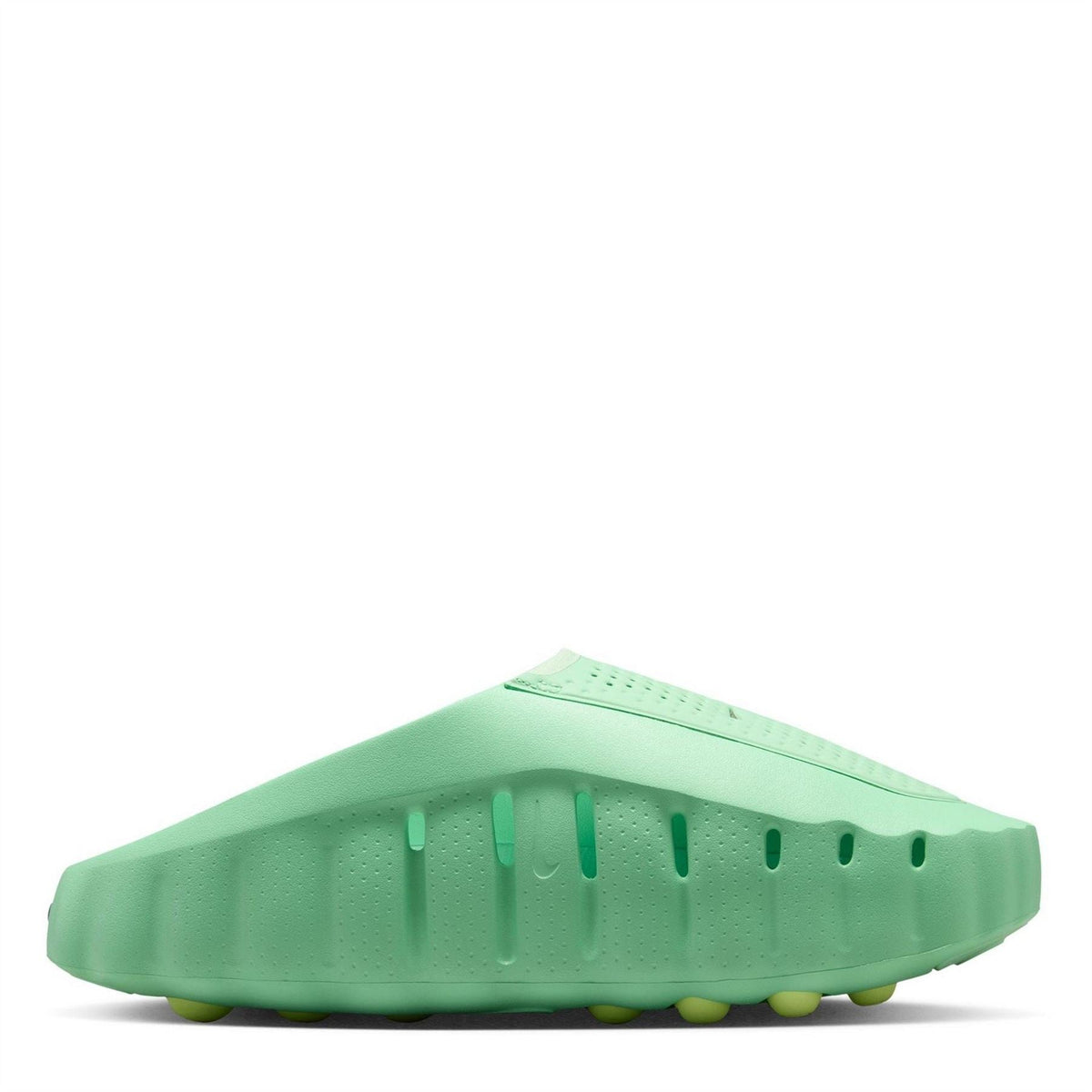 Volt green Nike slide sandals, outsole side profile with traction grooves