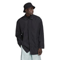 Black men’s button-front jacket with stand collar and long sleeves.