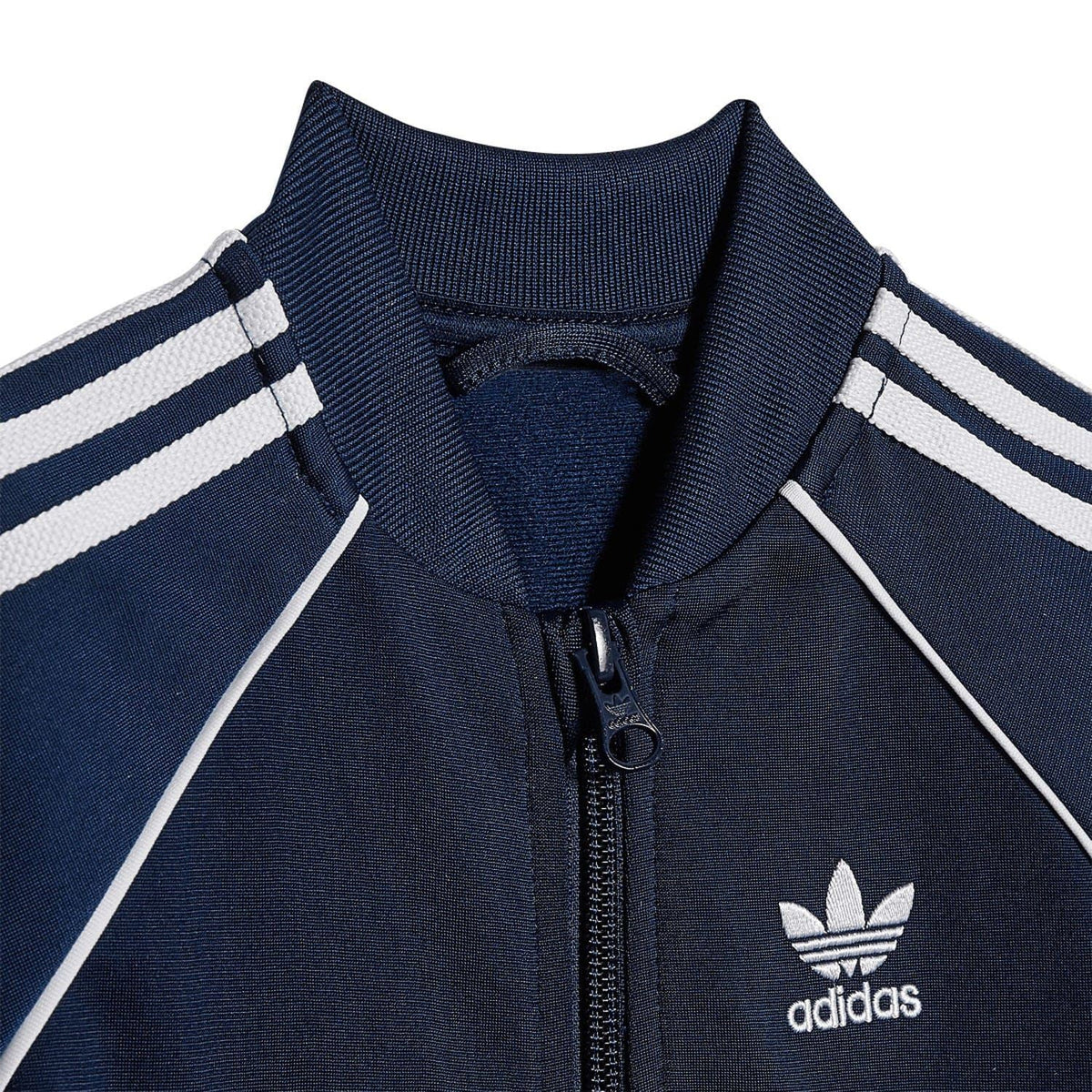 Infants navy adidas tracksuit top with ribbed collar, zip front, adidas logo.