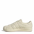 adidas Originals low top sneakers, cream shell toe with woven stripe panels