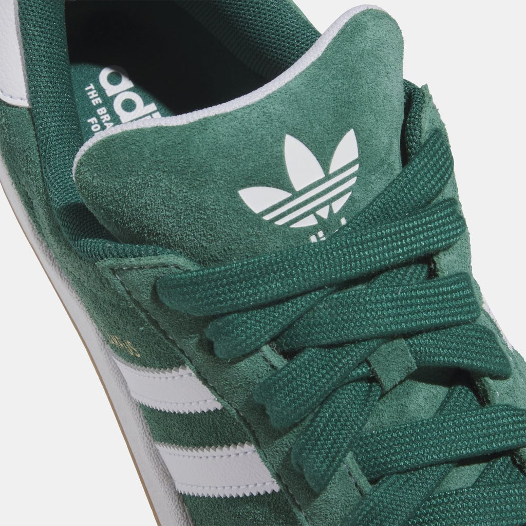 adidas Originals Campus ADV shoes close-up, dark green suede with adidas logo on tongue