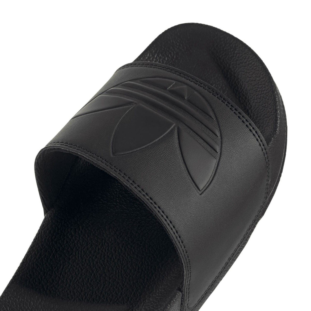Black molded strap featuring adidas three-stripe logo and curved stitching