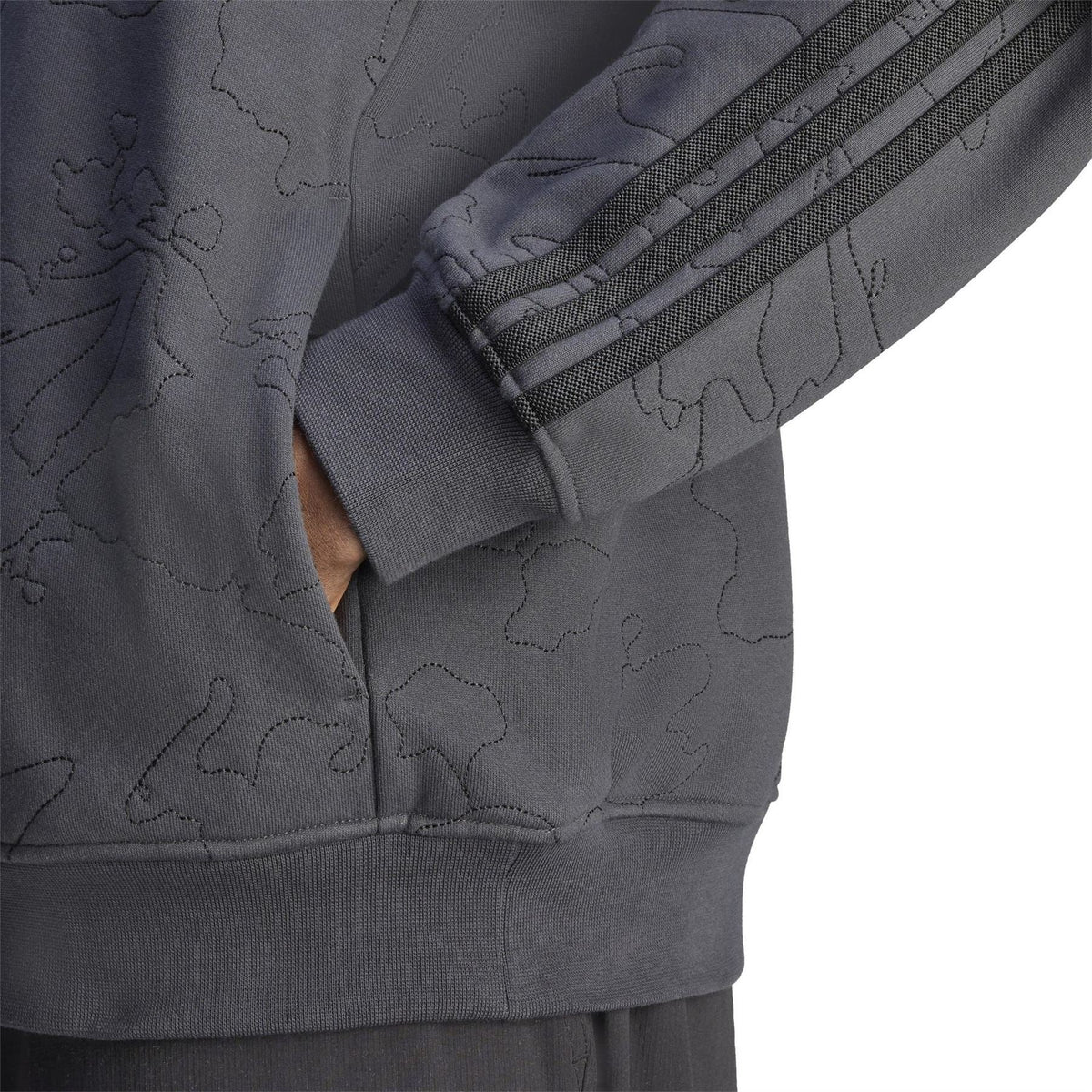 adidas Originals 100t hoodie sleeve cuff detail with ribbed hem and striped tape
